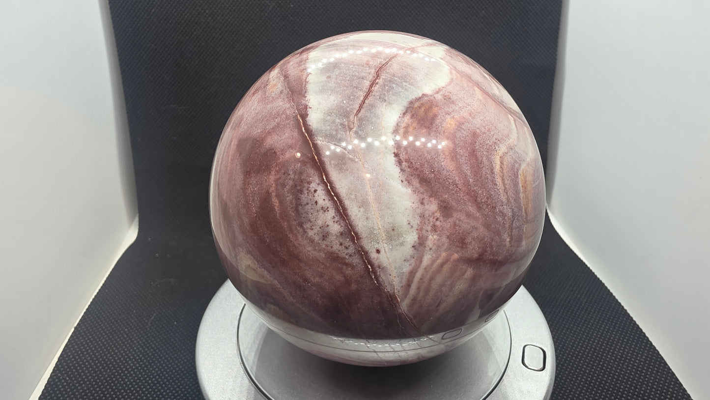 Banded ryolite (Wonderstone) sphere