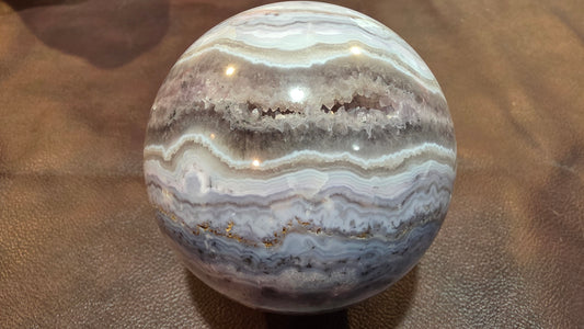 Sowbelly agate and amethyst sphere