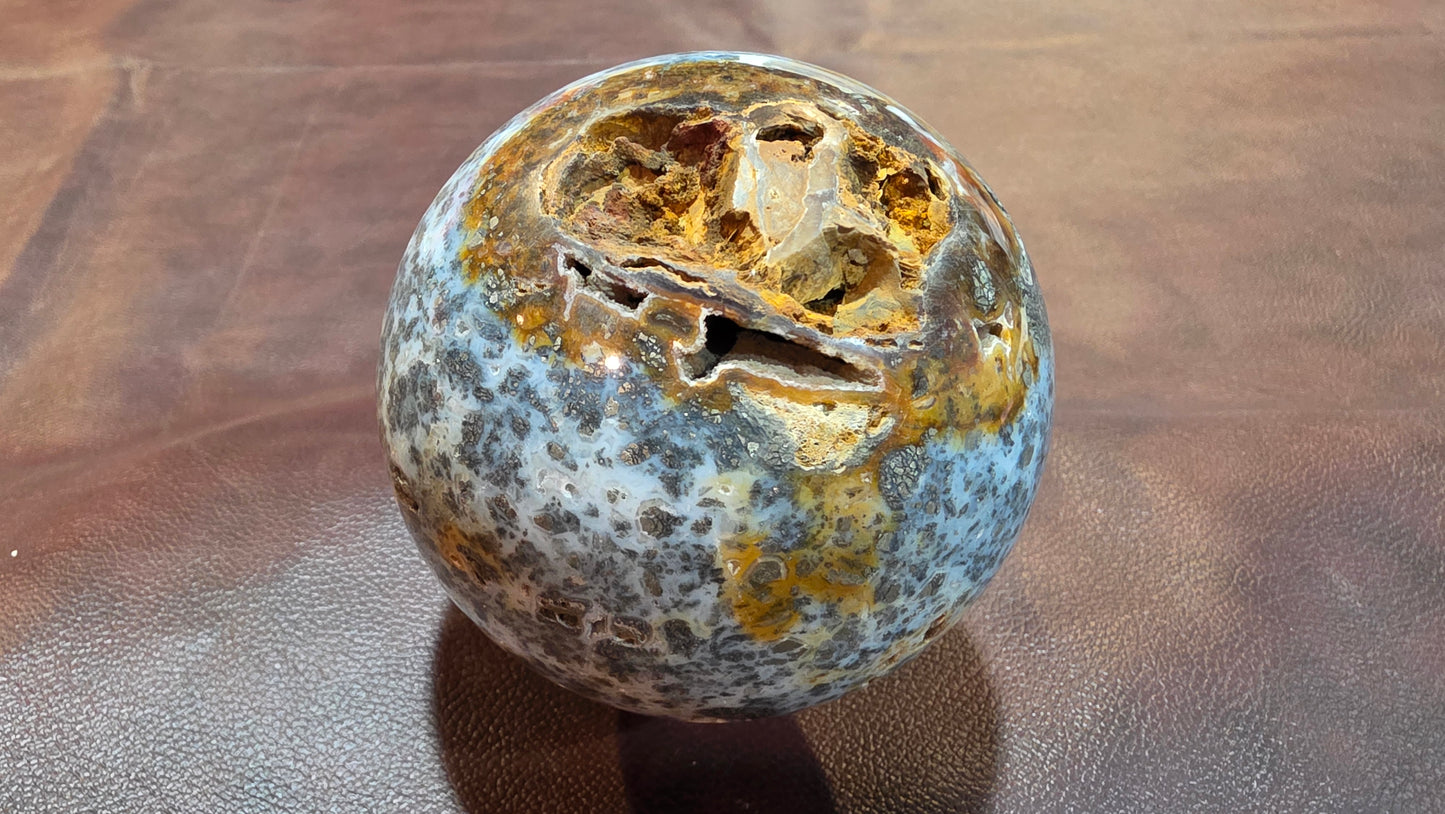 Marcasite in agate sphere